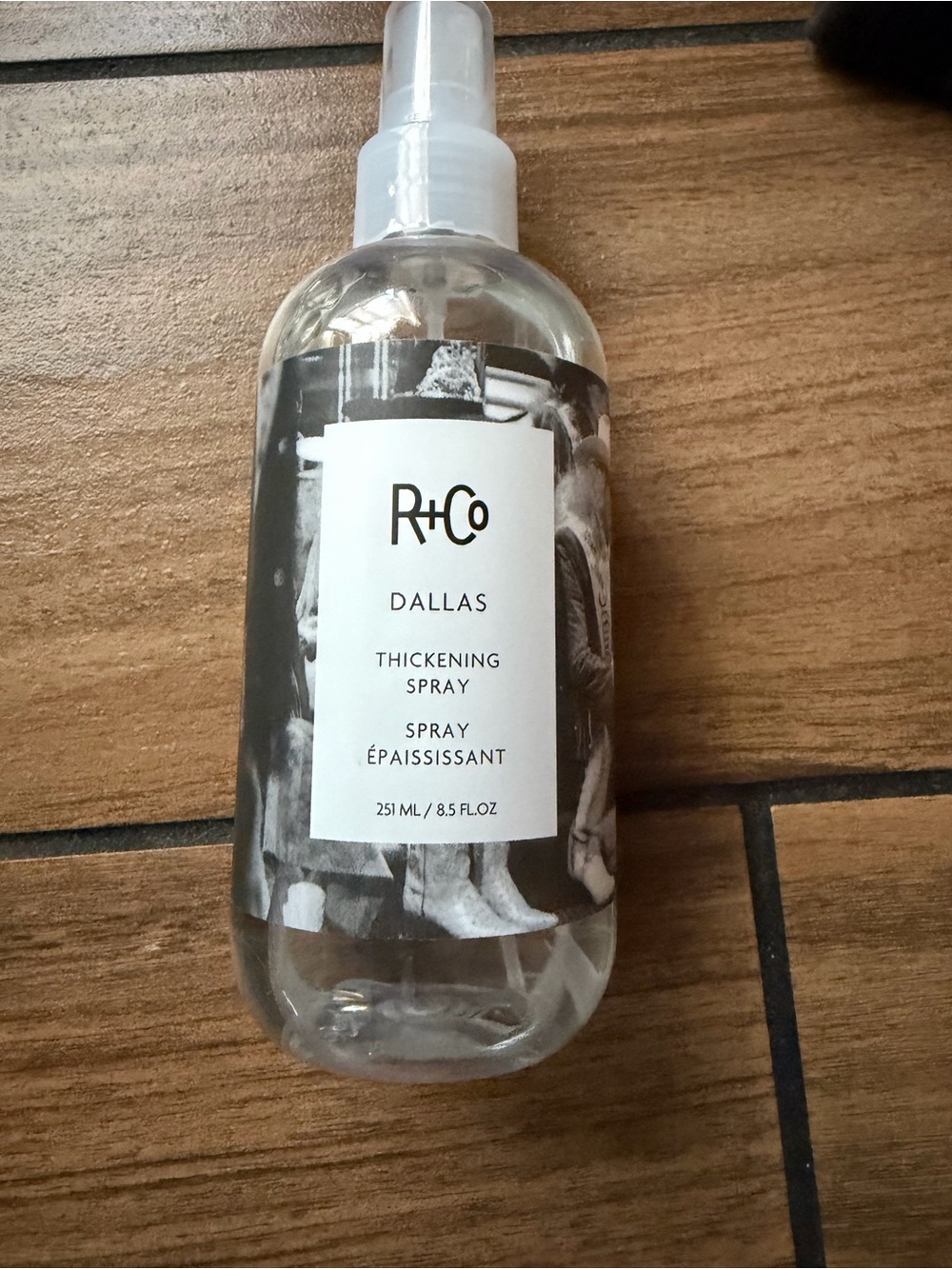 R+Co Dallas Thickening Spray in Clear Bottle with White Label